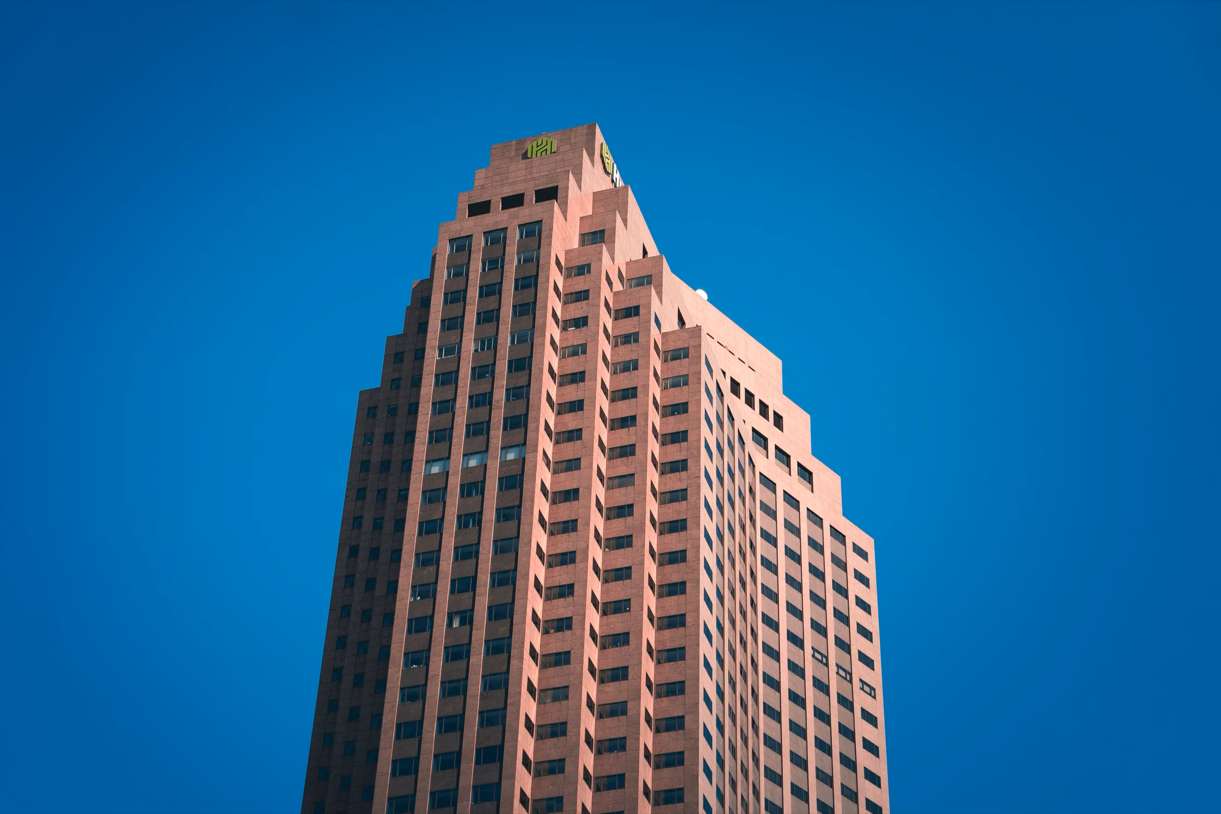 High-rise residential tower in Cleveland against a clear sky